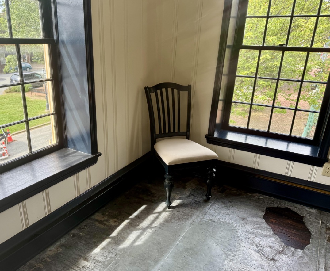 This second floor corner room in the Hippocratic Growth building once was home to the printing operations of the Kent News in the late 1800s and early 1900s.  Its wooden floor was lined with lead sheets to protect it from molten lead used for setting type in the printing process. 