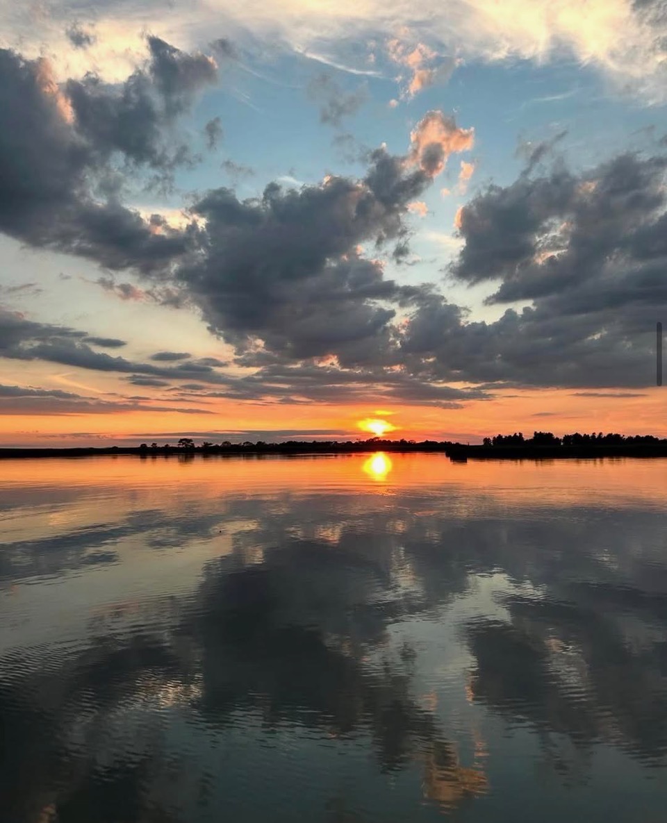 Another peaceful Chesapeake evening as the sun sinks into the Bay across from the Eastrn Neck National Wildlife Refuge. “End of Day” by Susanne Mclean.